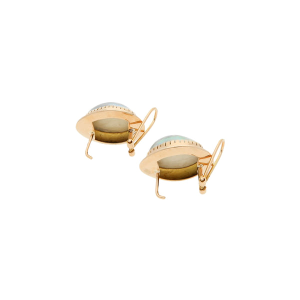 Juego de anillo y aretes diseño especial con medias perlas en oro amarillo 14 kilates.
