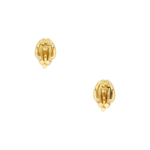 Broqueles huecos en oro amarillo 14 kilates.