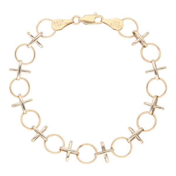 Pulsera eslabón combinado en oro dos tonos 14 kilates.