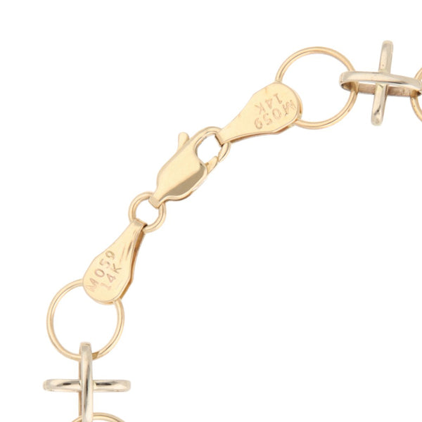 Pulsera eslabón combinado en oro dos tonos 14 kilates.