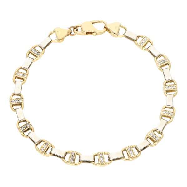 Pulsera eslabón nudo marino con diamantes en oro dos tonos 14 kilates.
