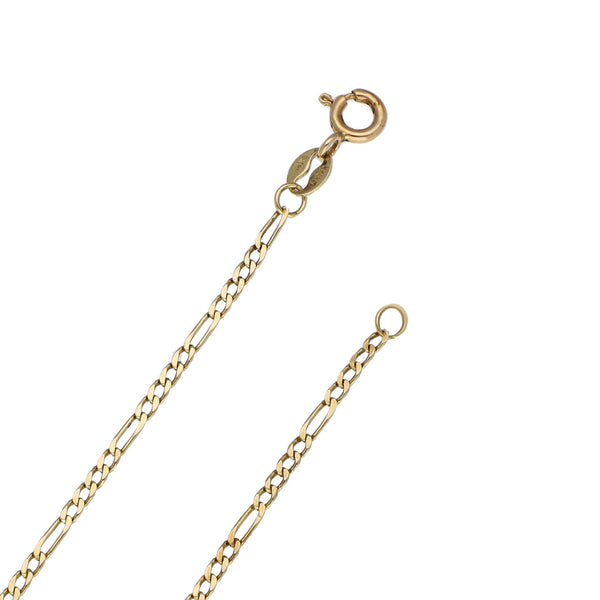 Collar de cuatro eslabones por uno y dije hueco motivo balón en oro amarillo 14 kilates.