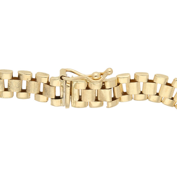 Pulsera eslabón articulado en oro amarillo 14 kilates.
