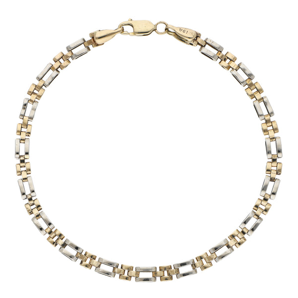 Pulsera eslabón articulado en oro dos tonos 14 kilates.