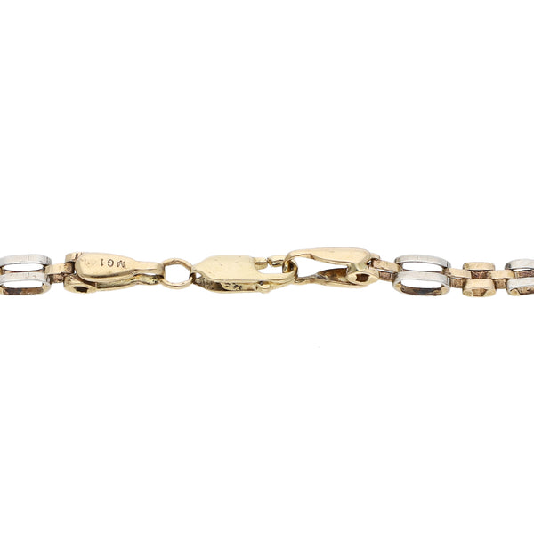 Pulsera eslabón articulado en oro dos tonos 14 kilates.