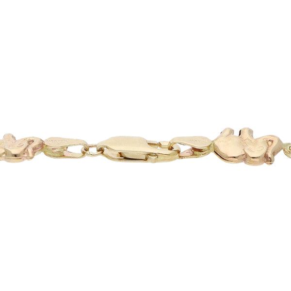 Pulsera eslabón articulado motivo elefantes en oro tres tonos 14 kilates.