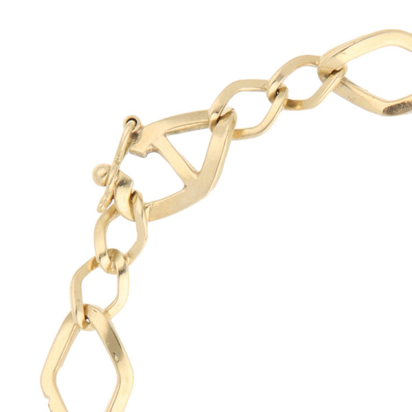 Pulsera eslabón combinado en oro amarillo 14 kilates.
