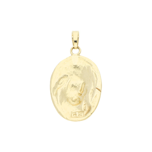 Medalla diseño especial motivo Divino Rostro en oro amarillo 14 kilates.
