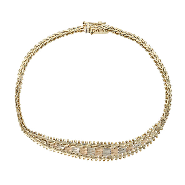 Pulsera eslabón boleado en oro tres tonos 14 kilates.
