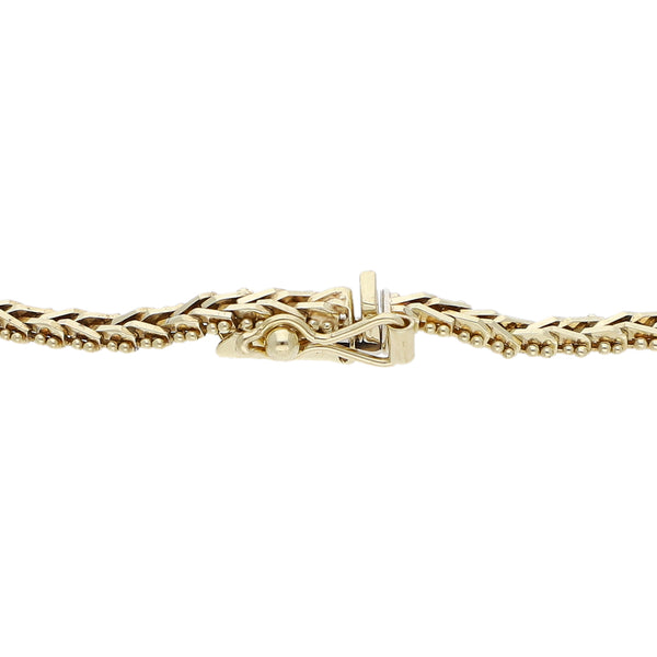 Pulsera eslabón boleado en oro tres tonos 14 kilates.