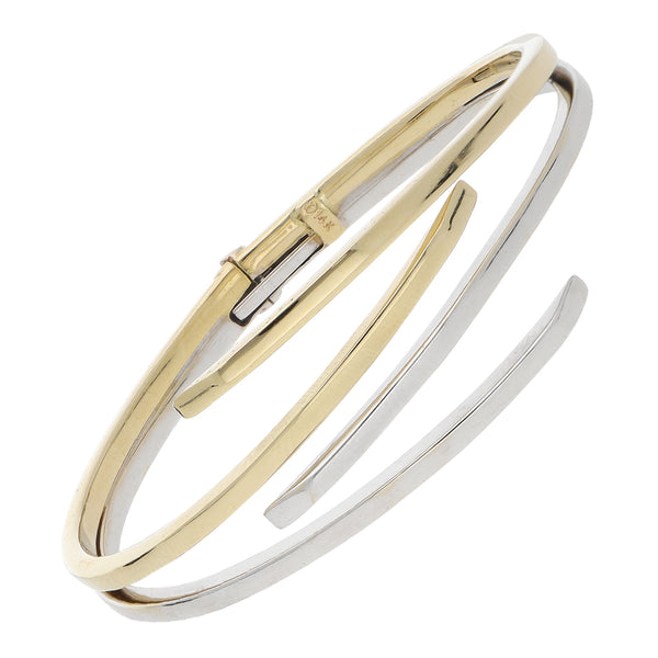 Pulsera de arillo de dos hilos articulada en oro dos tonos 14 kilates.