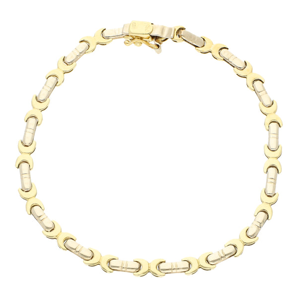 Pulsera eslabón articulado en oro dos tonos 14 kilates.