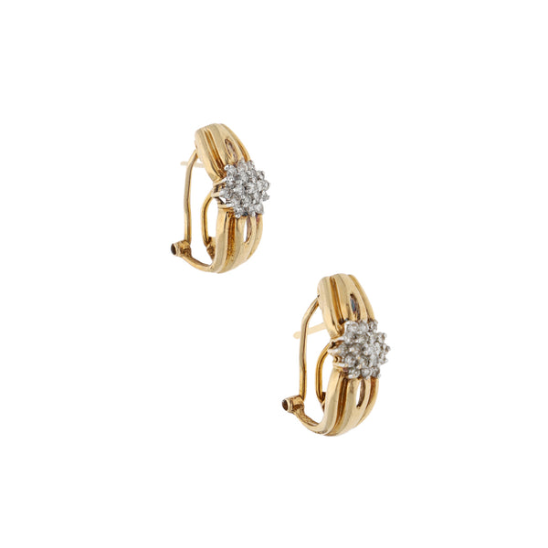 Aretes diseño especial con diamantes en oro amarillo 14 kilates.