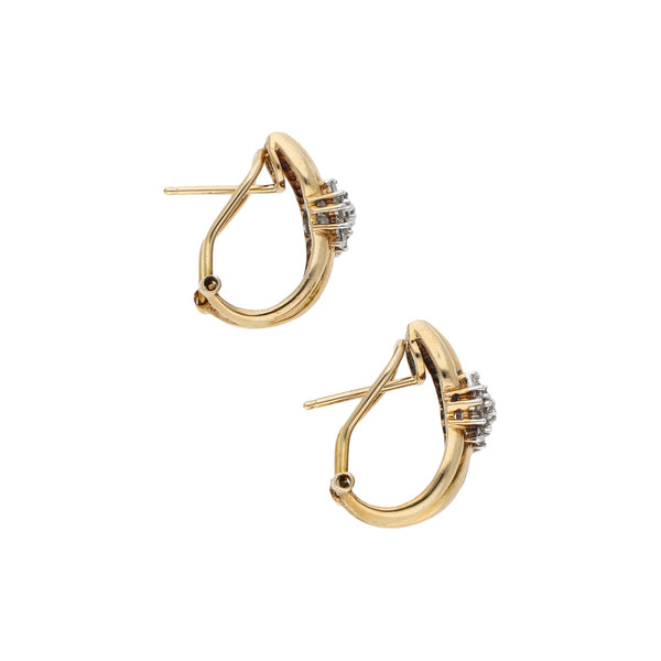 Aretes diseño especial con diamantes en oro amarillo 14 kilates.