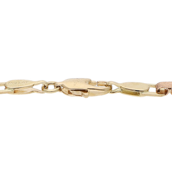Pulsera eslabón combinado en oro tres tonos 14 kilates.