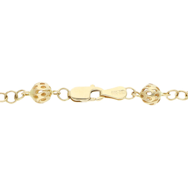 Pulsera tipo rosario eslabón cruzado en oro amarillo 14 kilates.
