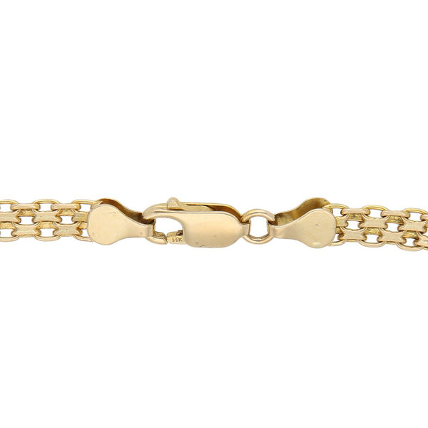 Pulsera eslabón combinado en oro amarillo 14 kilates.