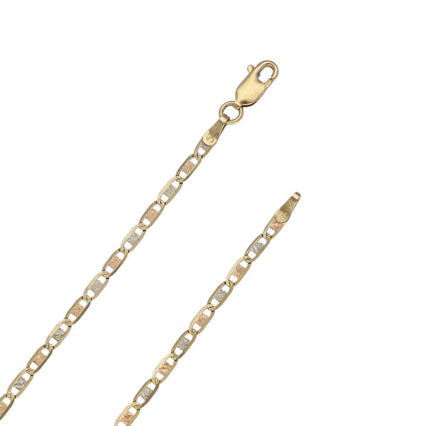 Collar eslabón nudo marino en oro tres tonos 14 kilates y dije laminado oro dos tonos 12 kilates.