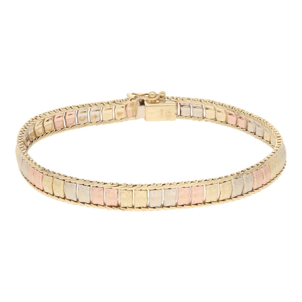 Pulsera eslabón planchado en oro tres tonos 14 kilates.