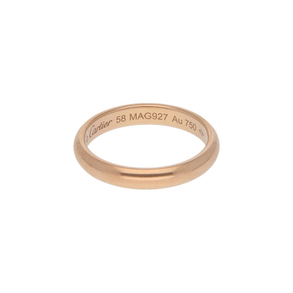 Argolla lisa firma Cartier en oro rosa 18 kilates.