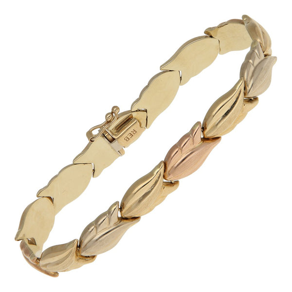 Pulsera eslabón articulado motivo flor en oro amarillo 14 kilates.