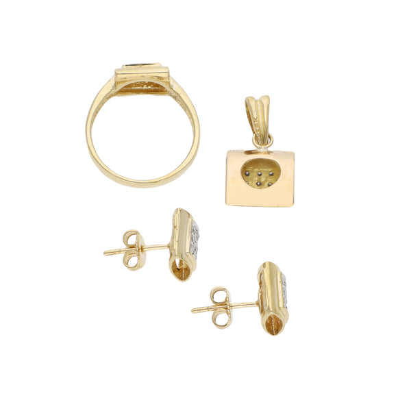 Juego de aretes, anillo y dije diseño especial con diamantes en oro amarillo 14 kilates.