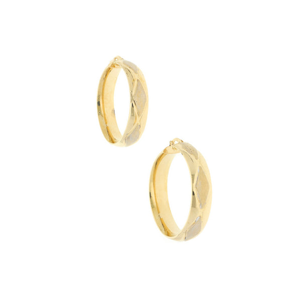 Arracadas labradas en oro amarillo 14 kilates.