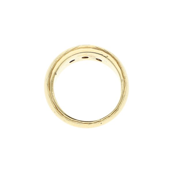 Anillo diseño especial con rubíes en oro amarillo 12 kilates.
