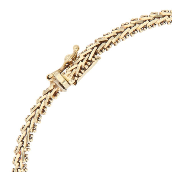 Pulsera eslabón boleado en oro tres tonos 14 kilates.