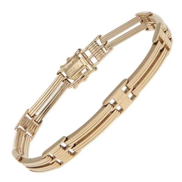 Pulsera eslabón articulado en oro amarillo 14 kilates.