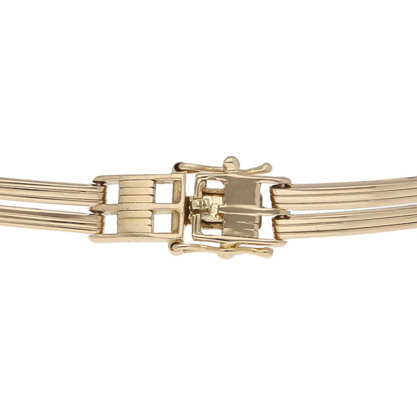 Pulsera eslabón articulado en oro amarillo 14 kilates.