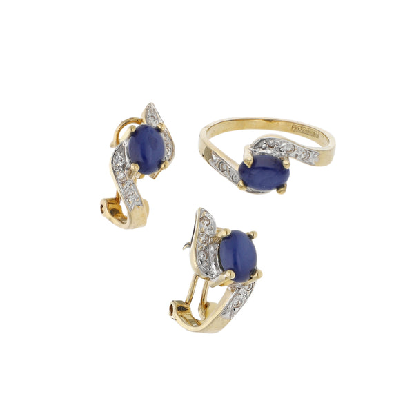 Juego anillo y aretes ondulados con zafiro estrella y sintéticos en oro amarillo 14 kilates.