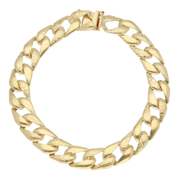 Pulsera eslabón barbado en oro amarillo 14 kilates.