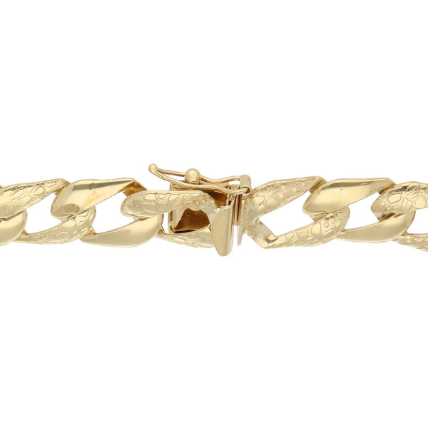 Pulsera eslabón barbado en oro amarillo 14 kilates.