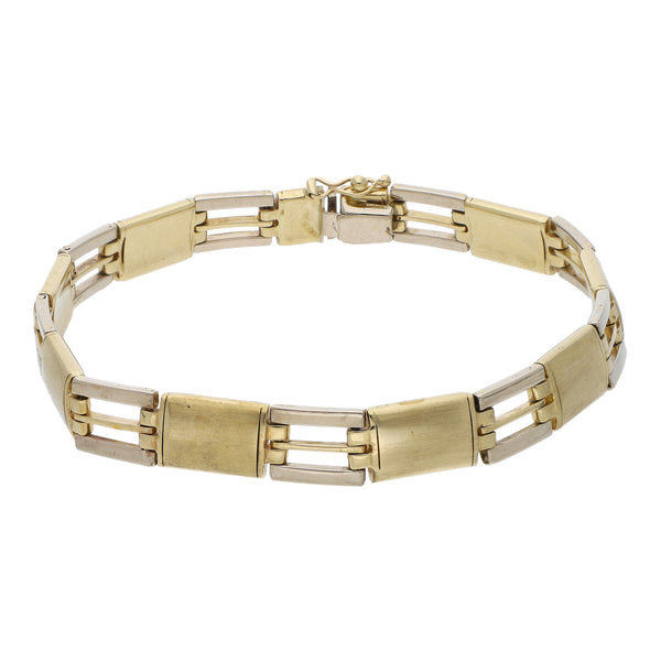 Pulsera eslabón articulado en oro dos tonos 14 kilates.