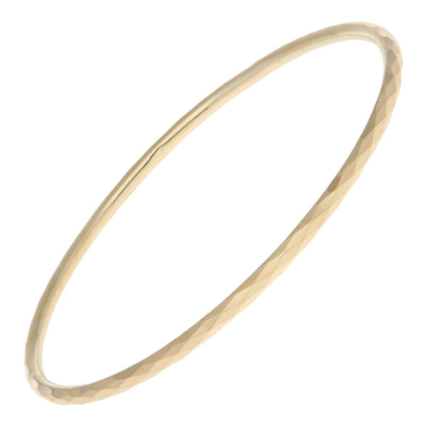 Pulsera de arillo facetada en oro amarillo 12 kilates.