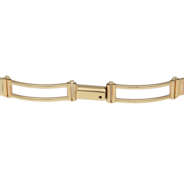 Pulsera eslabón laminado motivo elefantes en oro tres tonos 14 kilates.
