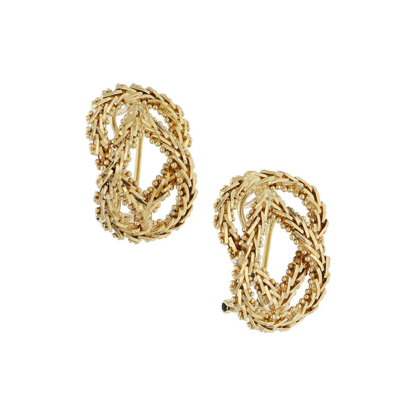 Aretes boleados en oro amarillo 14 kilates.
