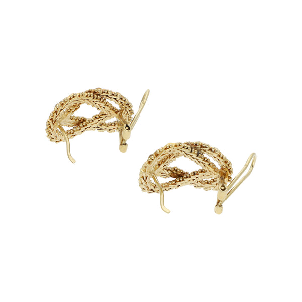 Aretes boleados en oro amarillo 14 kilates.