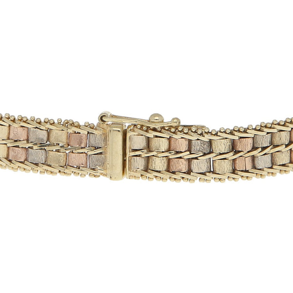 Pulsera eslabón boleado en oro tres tonos 14 kilates.