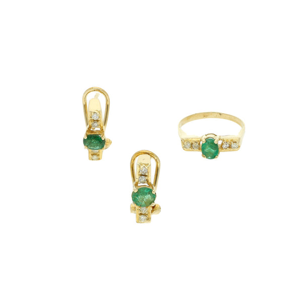Juego de anillo y aretes diseño especial con diamantes y esmeralda en oro amarillo 14 kilates.