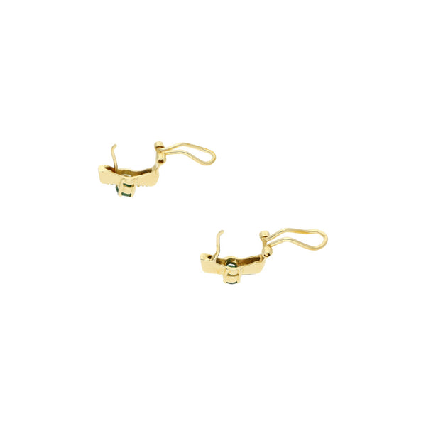 Juego de anillo y aretes diseño especial con diamantes y esmeralda en oro amarillo 14 kilates.