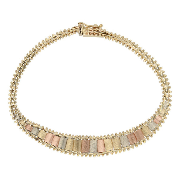 Pulsera eslabón boleado en oro tres tonos 14 kilates.