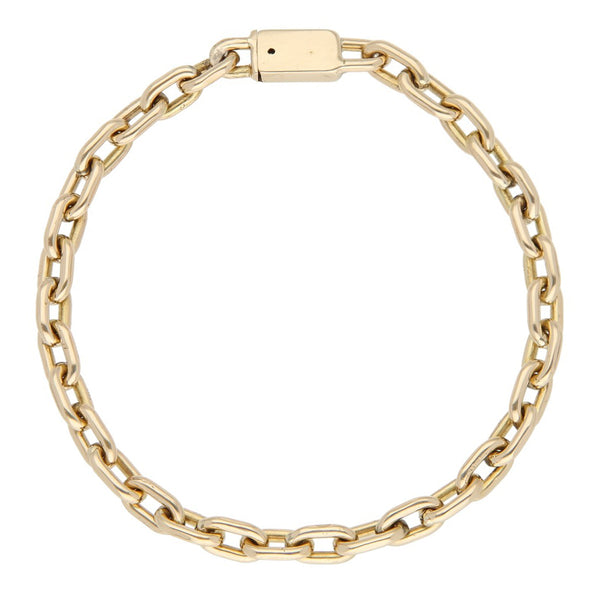 Pulsera eslabón cruzado en oro amarillo 14 kilates.