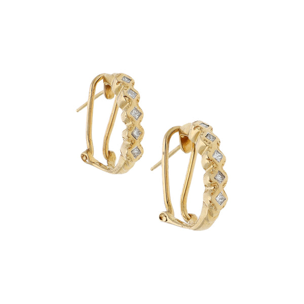 Aretes diseño especial con diamantes en oro amarillo 14 kilates.