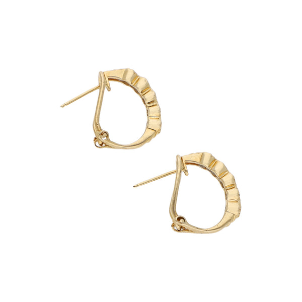 Aretes diseño especial con diamantes en oro amarillo 14 kilates.