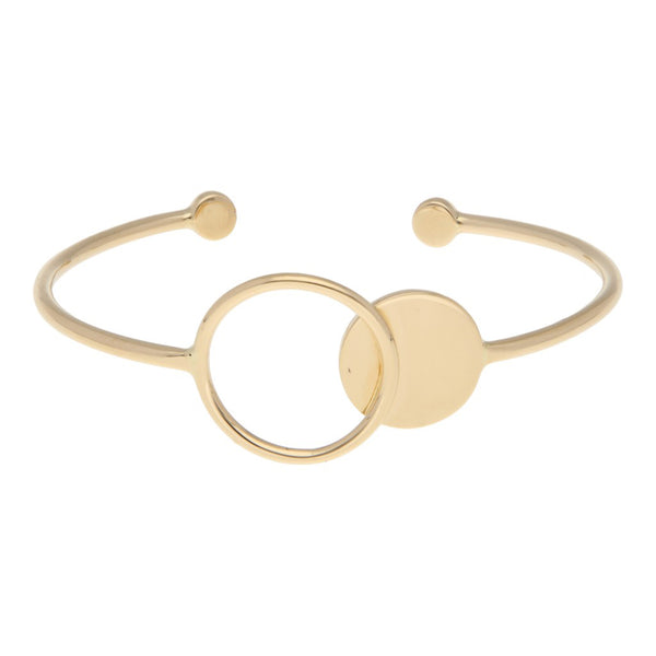 Pulsera de arillo abierta firma Tane en oro amarillo 18 kilates.