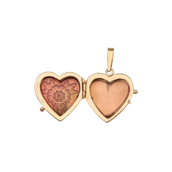 Dije porta retrato labrado motivo corazón en oro rosa 18 kilates.
