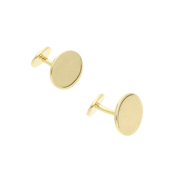 Mancuernillas lisas firma Tiffany & Co. en oro amarillo 18 kilates.