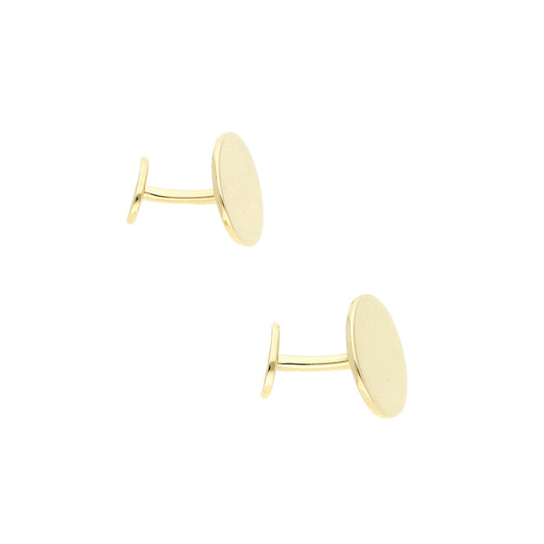 Mancuernillas lisas firma Tiffany & Co. en oro amarillo 18 kilates.